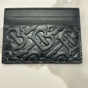Authentic Burberry embossed card holder black.  With free gift.